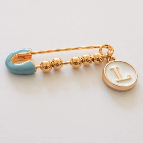 hellblaue Nadel mit 1 charm, gold