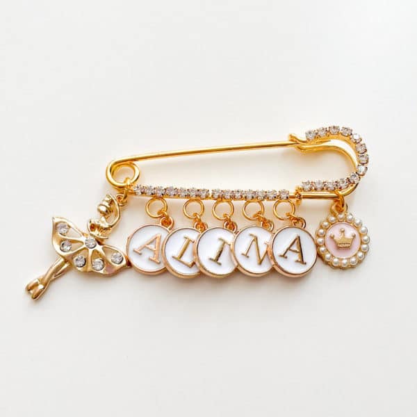 Strassnadel mit 7 Charms, gold